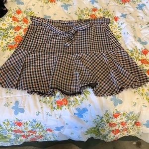 brown black and white skirt